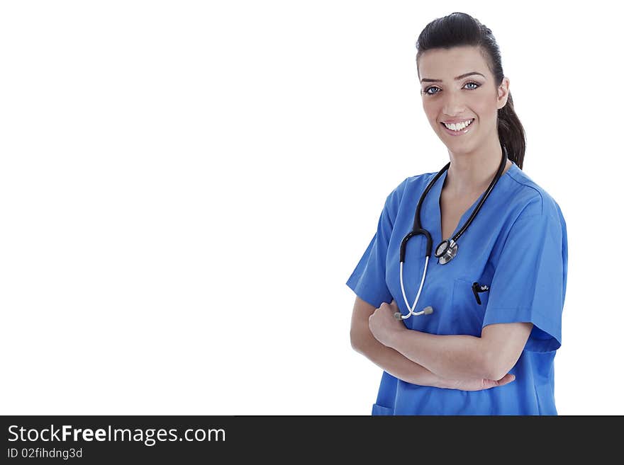 Young confident nurse posing at the camera on isolated white background