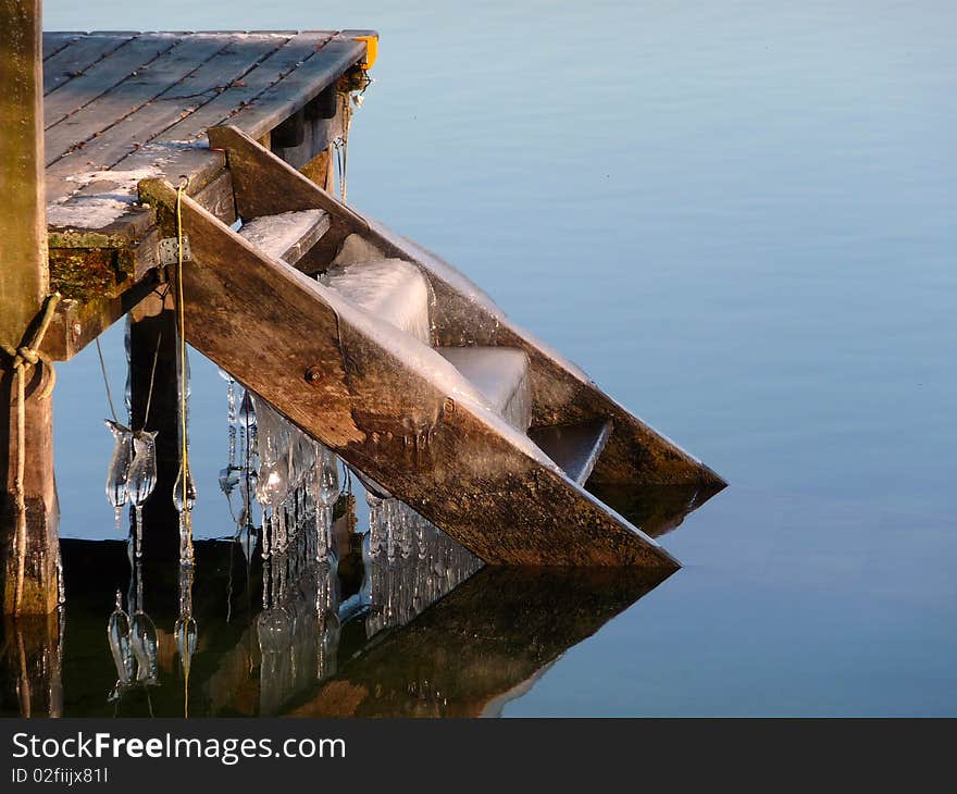 Icicles forming on steps of a boat shed. Icicles forming on steps of a boat shed