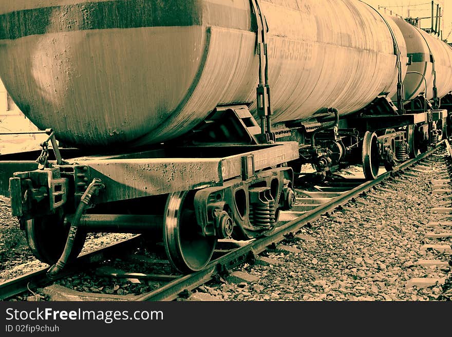 Old railway tank car parked on the tracks