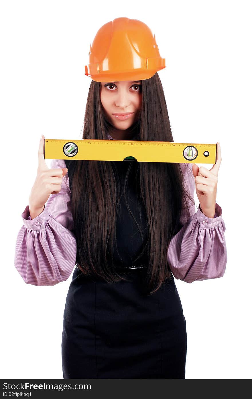 Charming young businesswoman builder orange helmet is isolated on a white background. Charming young businesswoman builder orange helmet is isolated on a white background