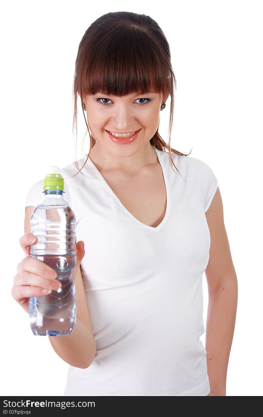 A charming young girl in a white T-shirt makes a sports exercise isolated on white