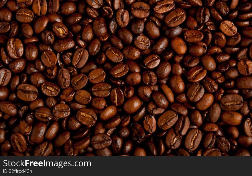 Lot of coffee beans background.