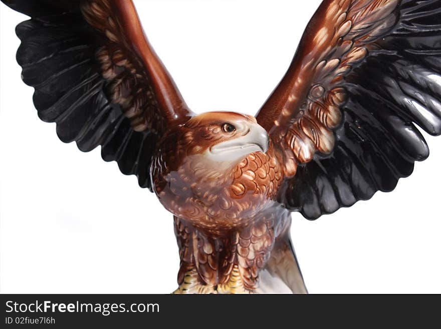 Figurine of an eagle on white background. Figurine of an eagle on white background