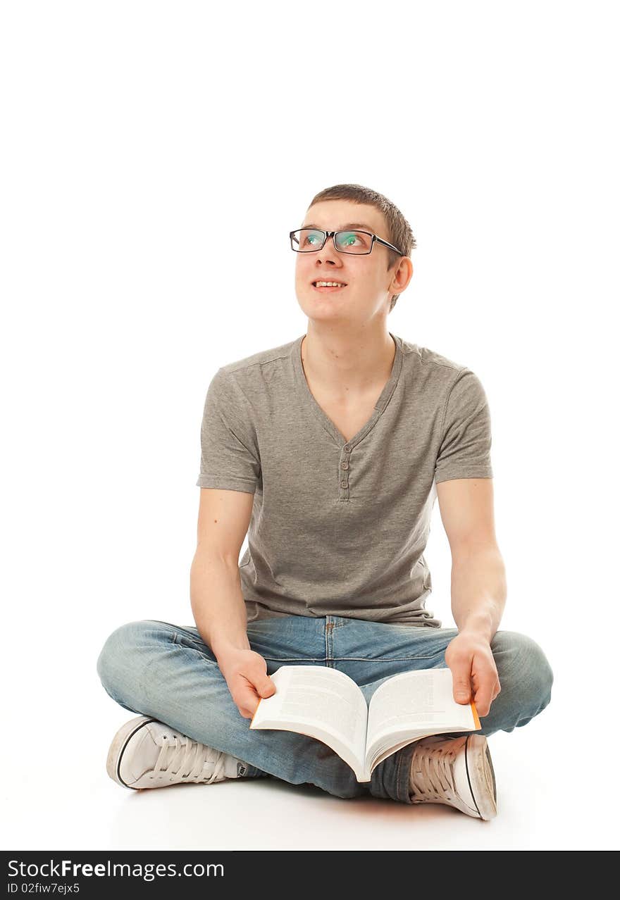 The young student with the book isolated on a white background