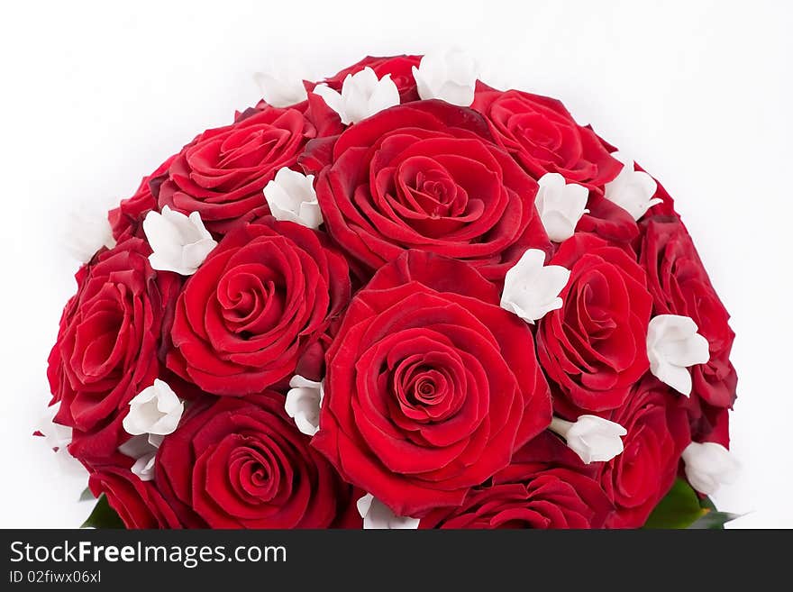 Detail of a red roses and white flowers wedding bouquet