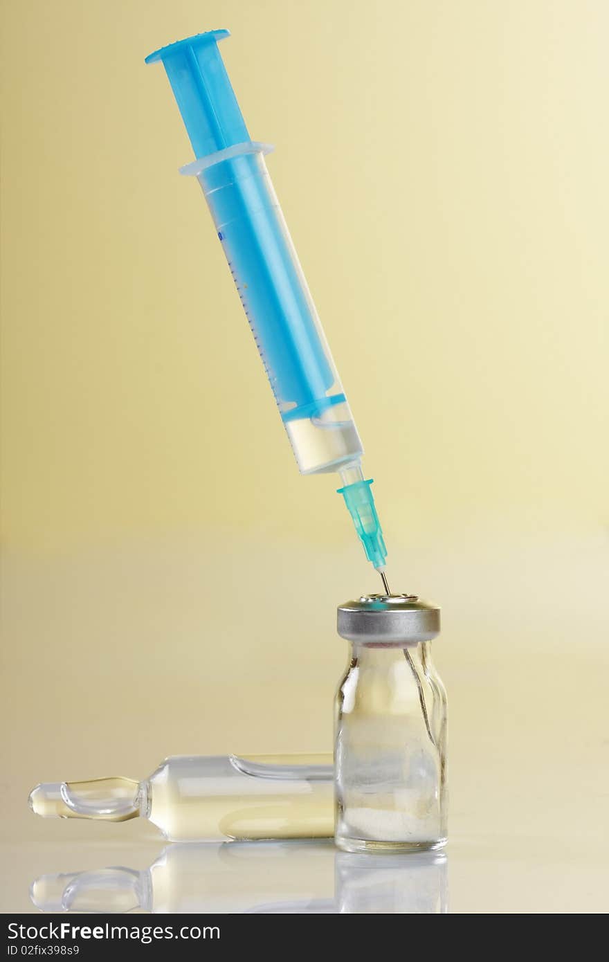 Close up image of a medicine vials and syringe. Search and testing of serum against the virus Covid-19