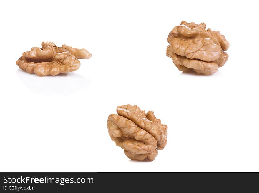 Tasty walnuts at white background