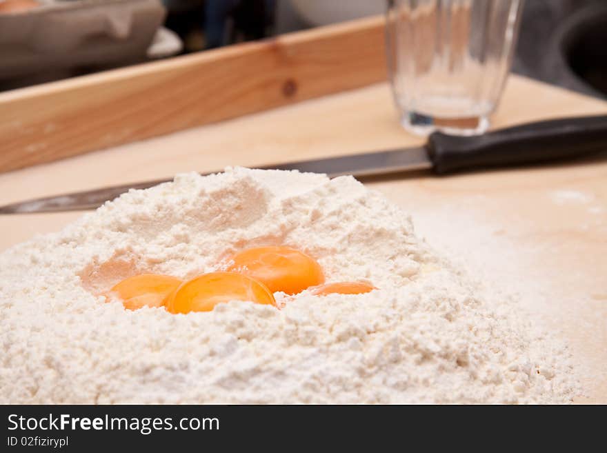 Fresh eggs and flour laying in the kitchen