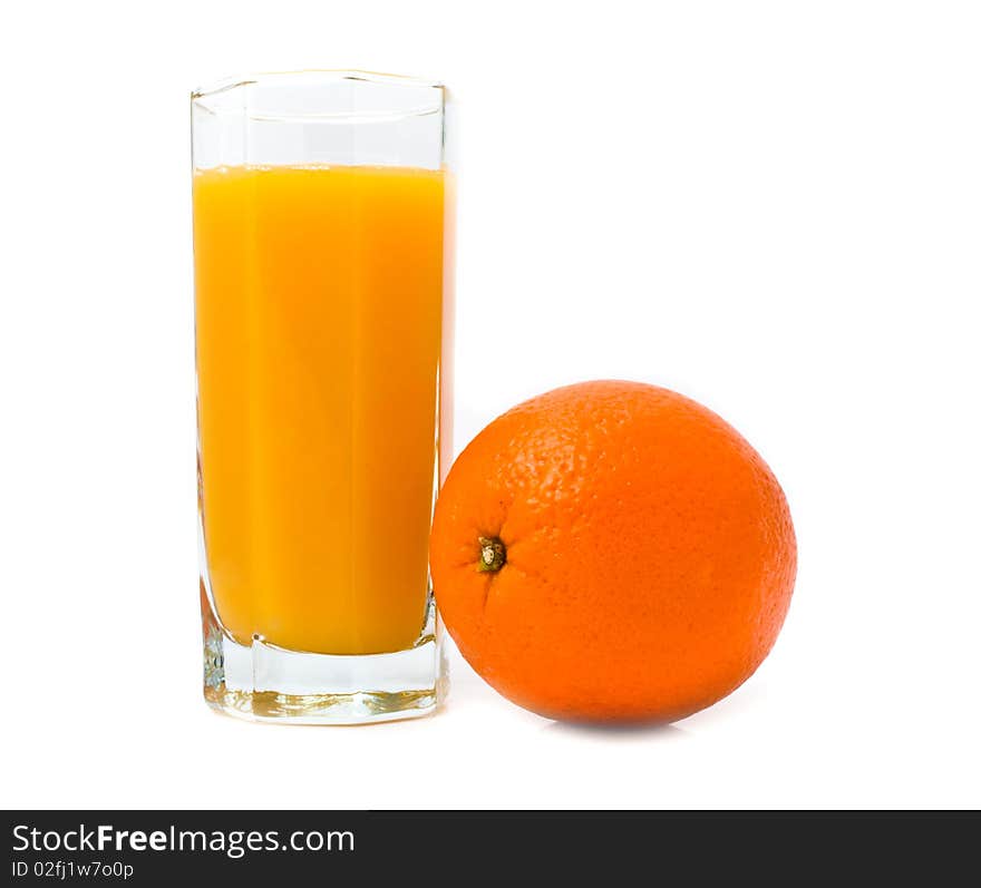 Glass with orange juice and orange on a white background