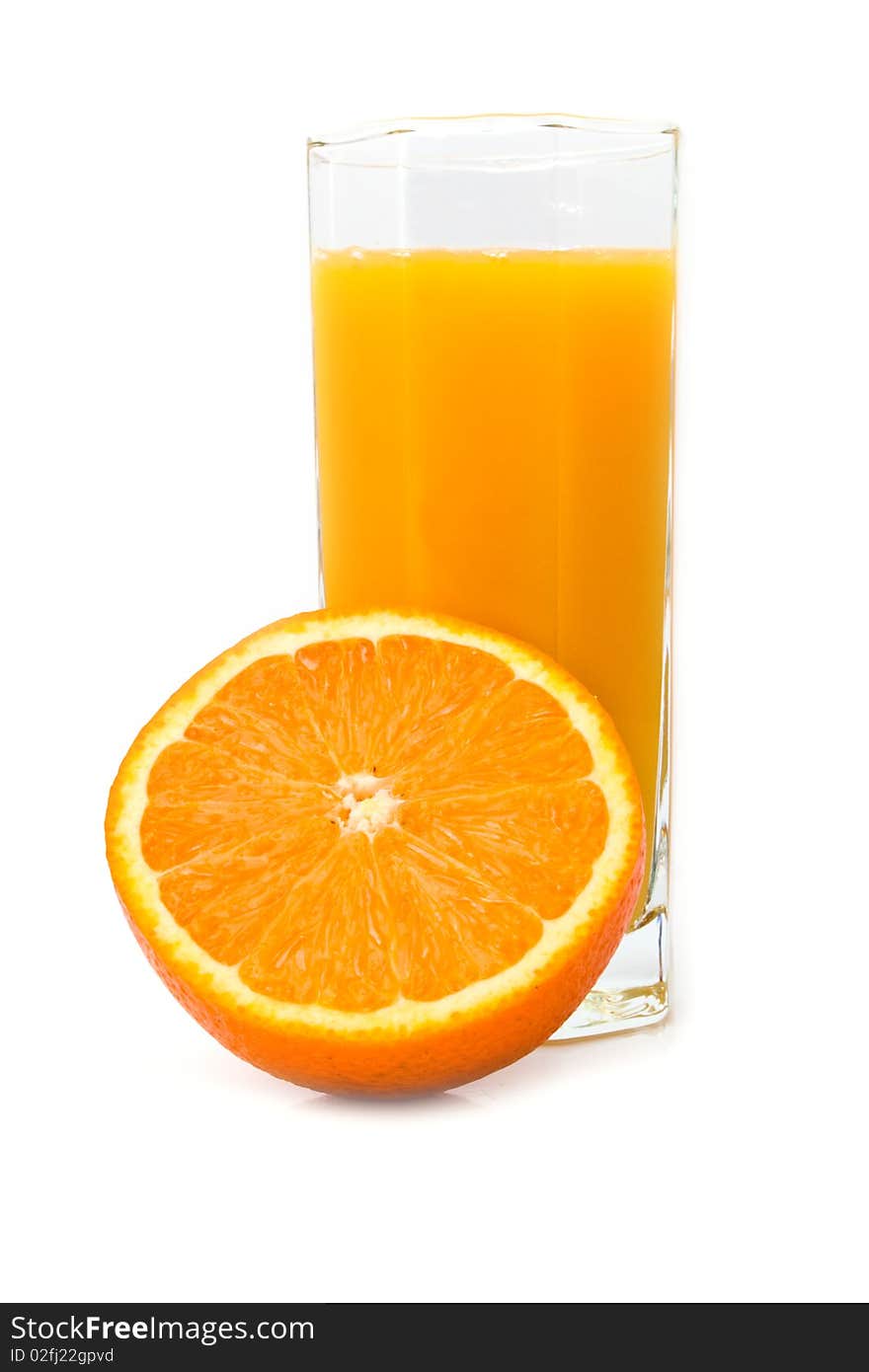 Glass with orange juice and orange on a white background