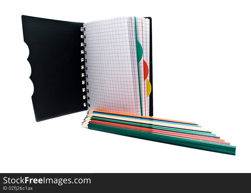 Notebook With A Spring And Pencils