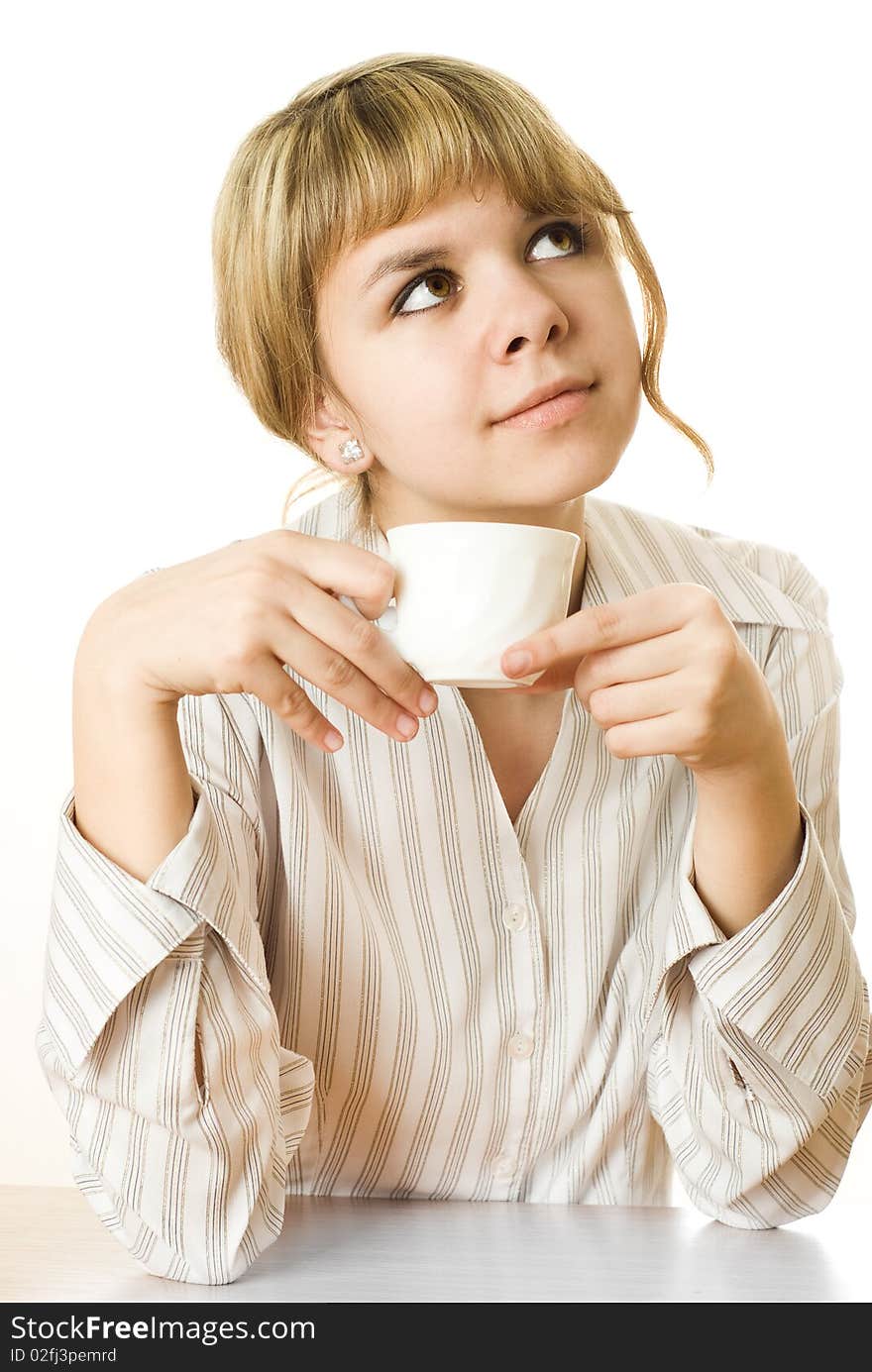 Beautiful young girl with a cup on a white background