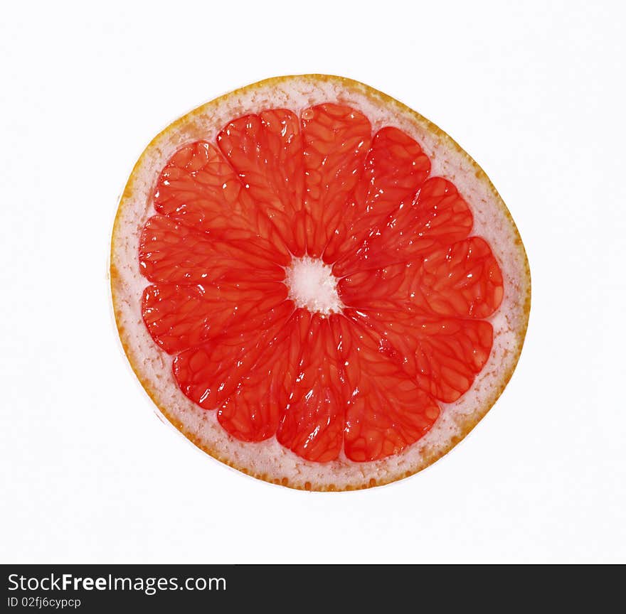 Half Of Juicy Red Grapefruit