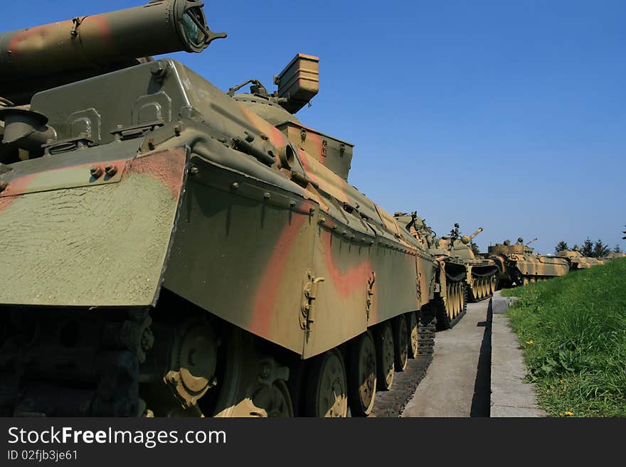 Soviet tanks at the War memorial located in Kiev with the motherland statue