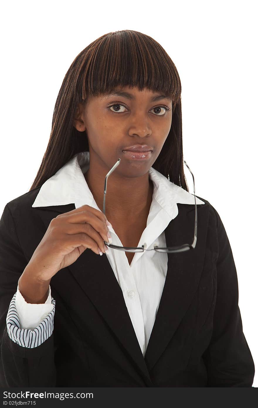 Young black female executive taking of spectacles. Young black female executive taking of spectacles