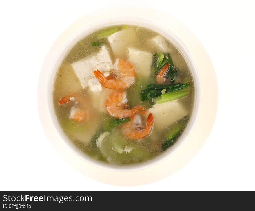 Prawns tofu soup. Close up on white background