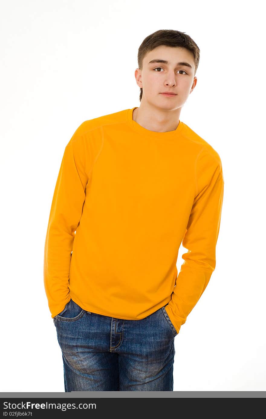 Beautiful young man standing on a white