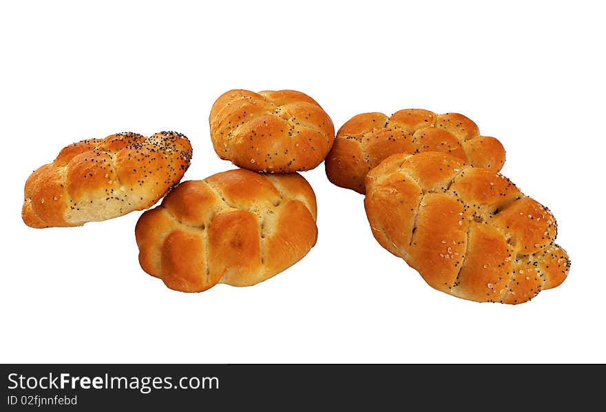 Several beautifully baked buns sprinkled with salt and poppy seeds on a white background. Several beautifully baked buns sprinkled with salt and poppy seeds on a white background