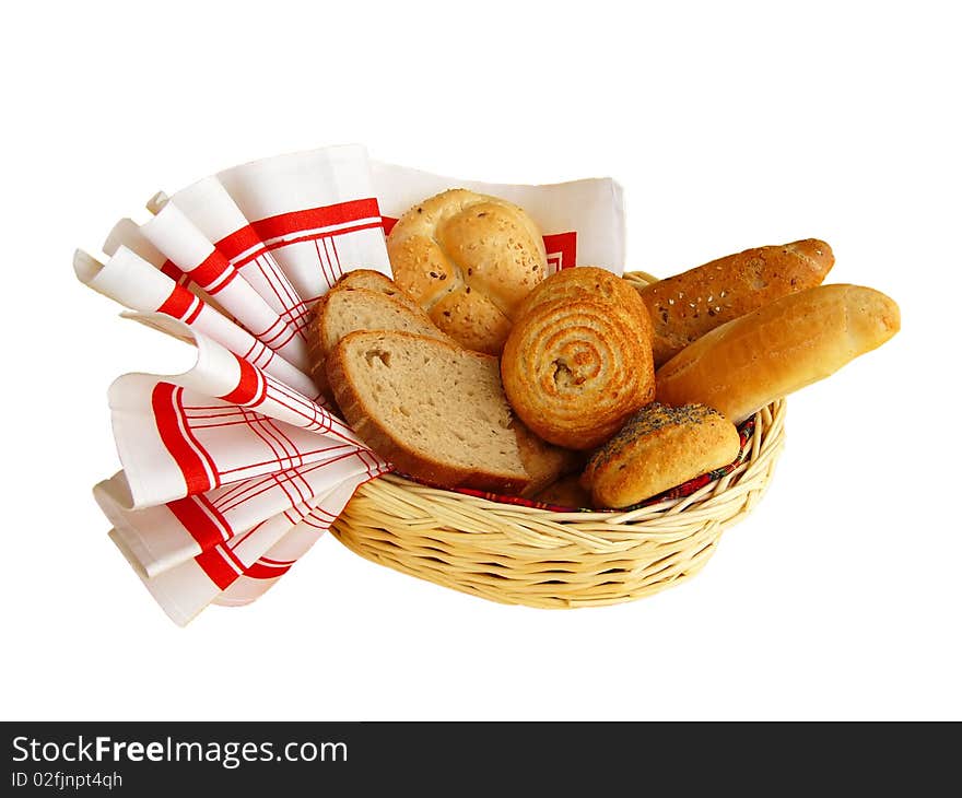 Rolls, buns and bread in a basket with a cloth. Rolls, buns and bread in a basket with a cloth