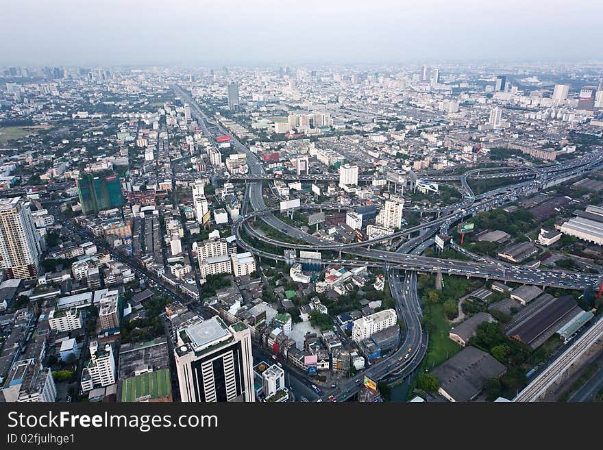 View from the Bayoke Sky Hotel on Bangkok. Buildings in Bangkok highlighting the pollution problem showing the smog on a relatively clear day.