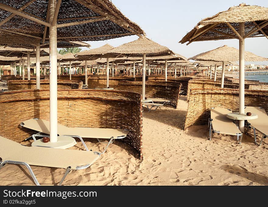 Sunbeds and umbrellas on the beach