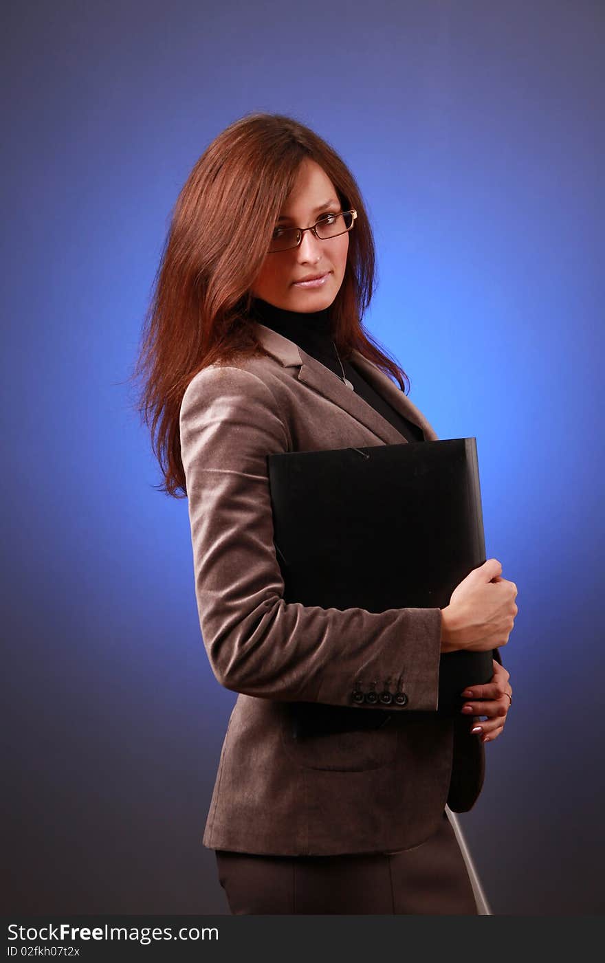 Beautiful business-woman with organizer. Beautiful business-woman with organizer