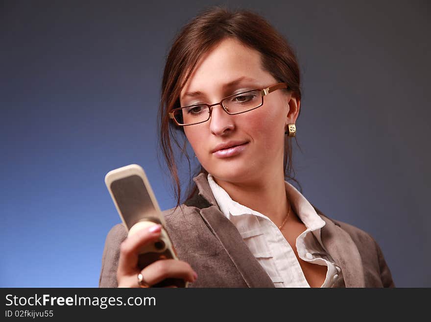 Elegant young bussiness woman calling phone. Elegant young bussiness woman calling phone