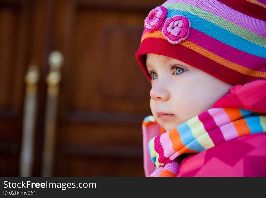 Portrait of beautiful child in stripe cap