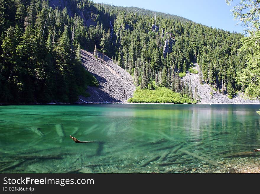 Summer hiking view in green drop lake. Summer hiking view in green drop lake.