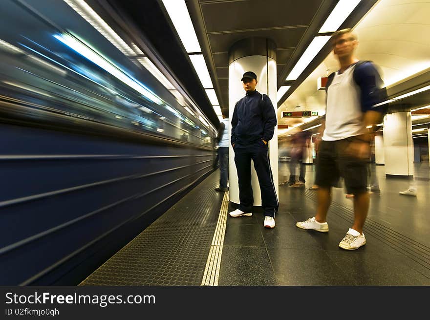 2 young man waiting for the subway. 2 young man waiting for the subway