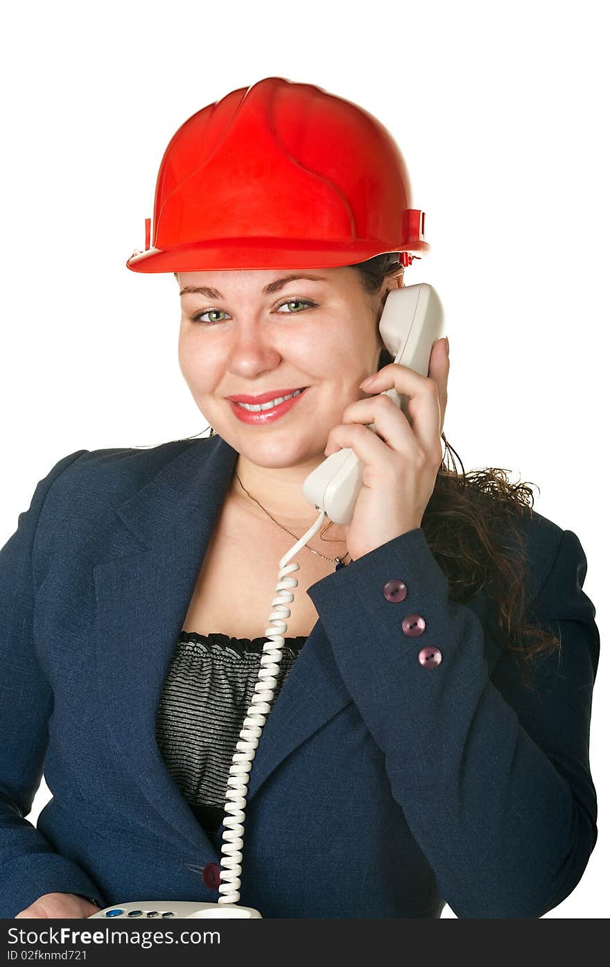 Young woman architect in red helmet calling by phone. Isolated on white background. Young woman architect in red helmet calling by phone. Isolated on white background