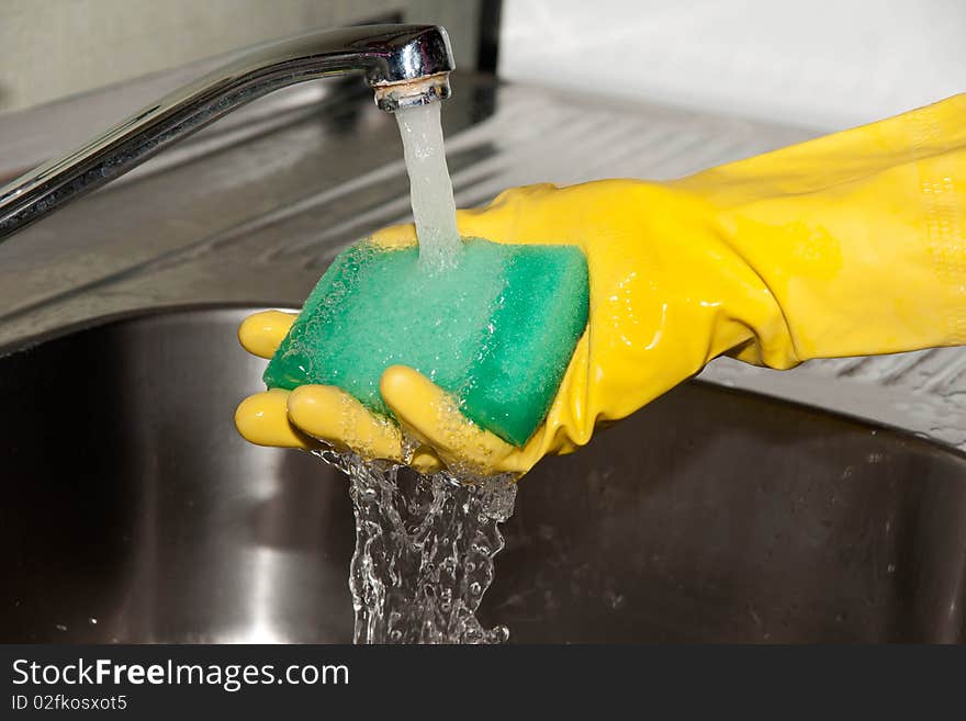 A process of cleaning kitchen