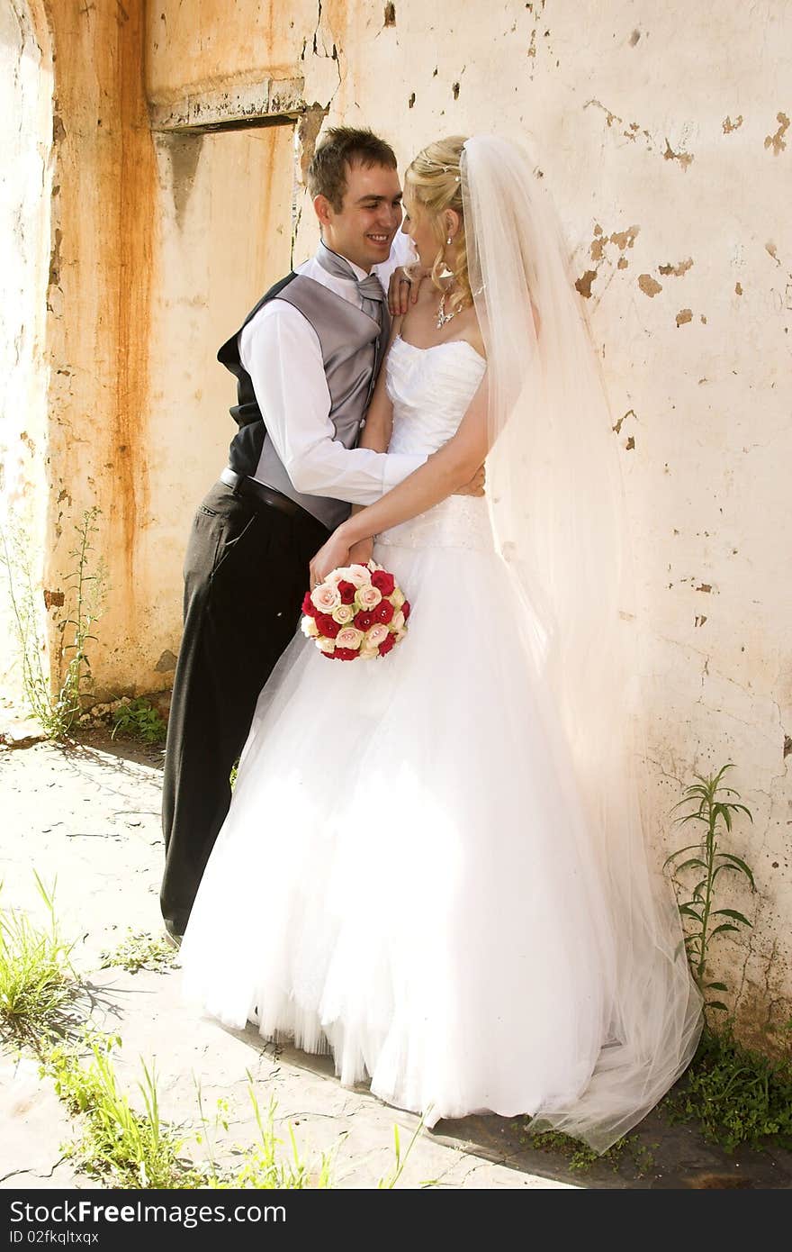 Beautiful Blond bride and her groom on their wedding day. Beautiful Blond bride and her groom on their wedding day