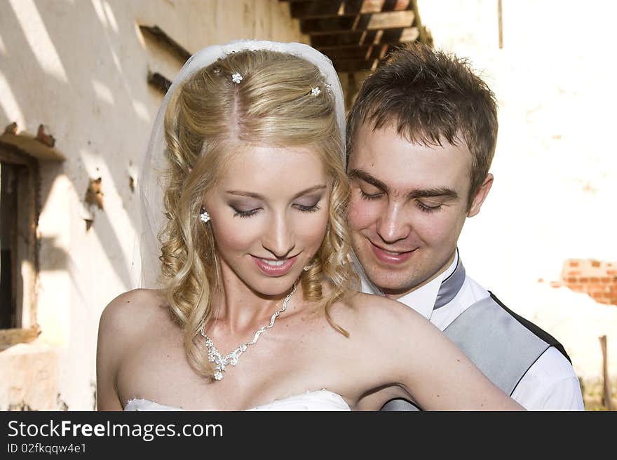 Beautiful Blond bride and her groom on their wedding day. Beautiful Blond bride and her groom on their wedding day