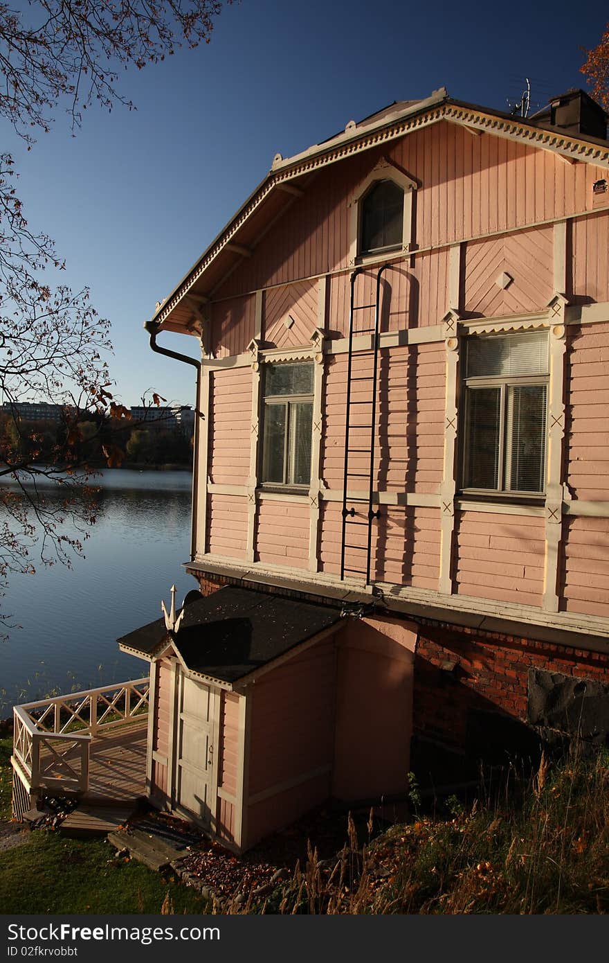 Old wooden house in central Helsinki on the lake  shore