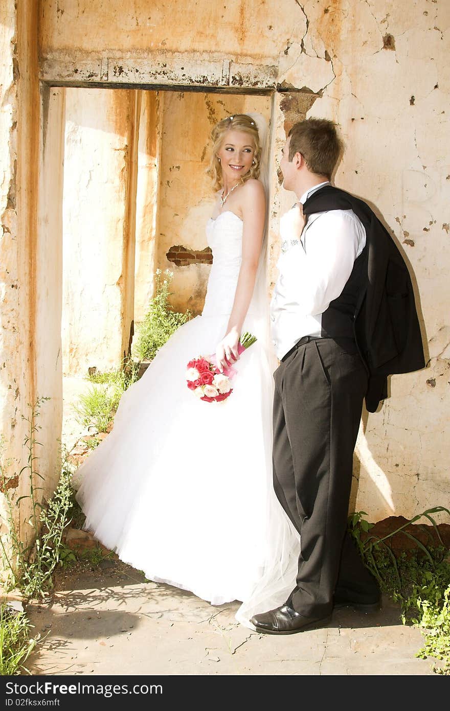 Beautiful Blond bride and her groom on their wedding day. Beautiful Blond bride and her groom on their wedding day