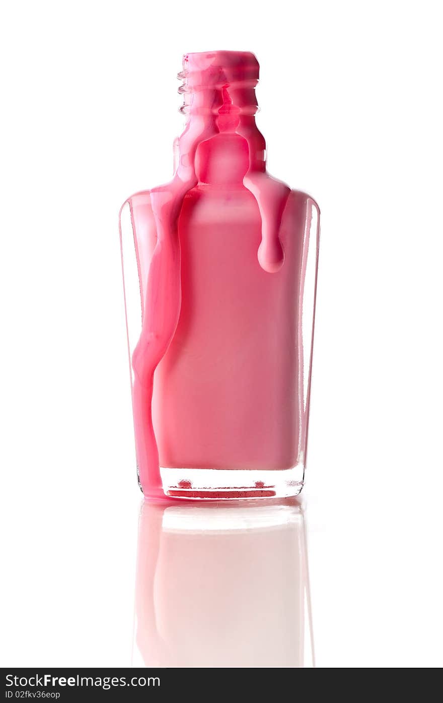 Pink nail polish running out of a container