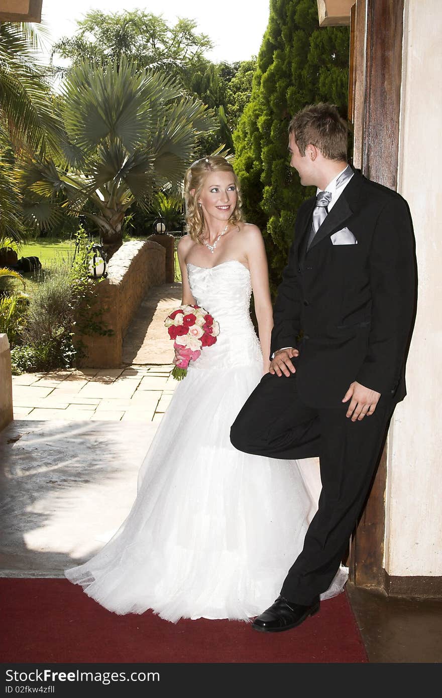 Beautiful Blond bride and her groom on their wedding day. Beautiful Blond bride and her groom on their wedding day