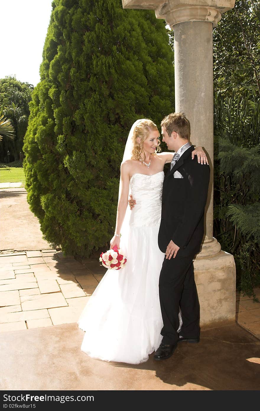 Beautiful Blond bride and her groom on their wedding day. Beautiful Blond bride and her groom on their wedding day