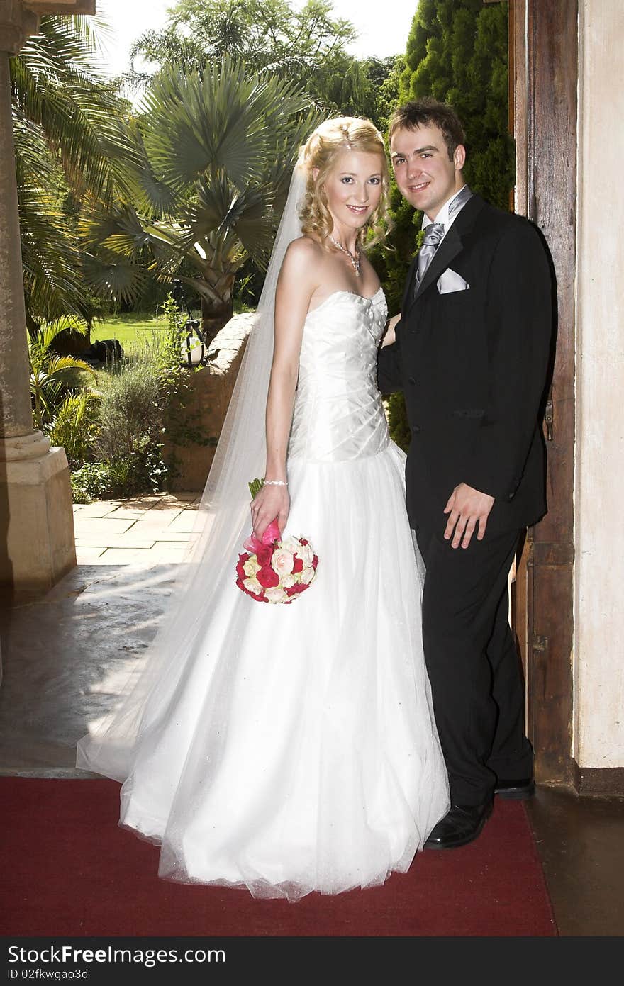 Beautiful Blond bride and her groom on their wedding day. Beautiful Blond bride and her groom on their wedding day