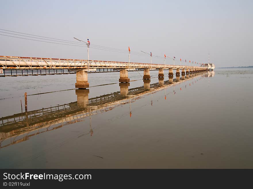 Bridge and reflection, taken in northeast of Thailand. Bridge and reflection, taken in northeast of Thailand