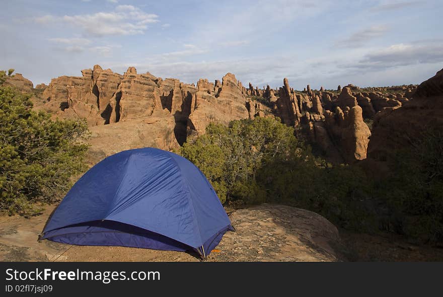 Tent perched on the rocks in the backcountry of Arches. Tent perched on the rocks in the backcountry of Arches