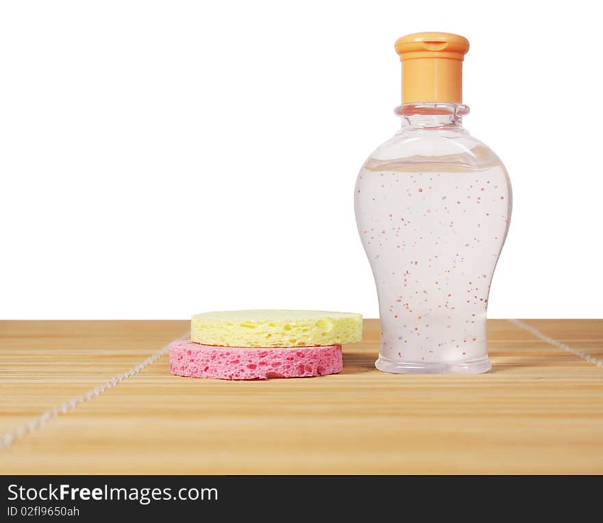 Cosmetic bottle with cellulose sponge