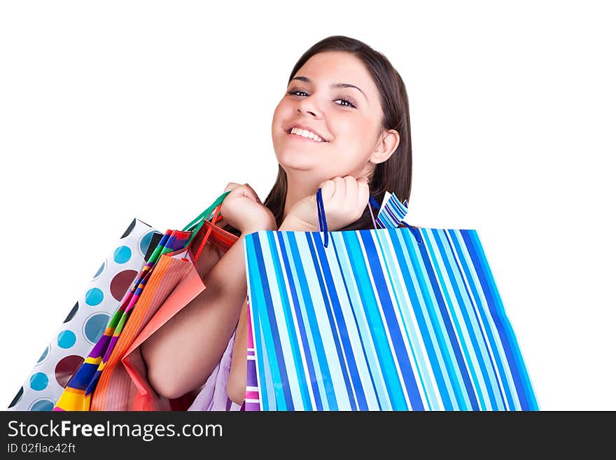 Happy young woman with shopping paper bags. Happy young woman with shopping paper bags