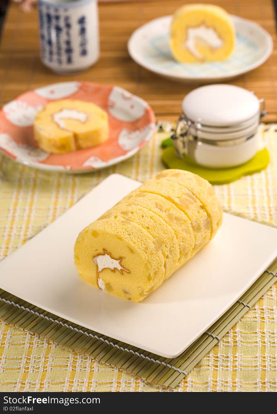 Cream roll is the sweet bakery. Used to serve with the tea or coffee in the light meal. Cream roll is the sweet bakery. Used to serve with the tea or coffee in the light meal.