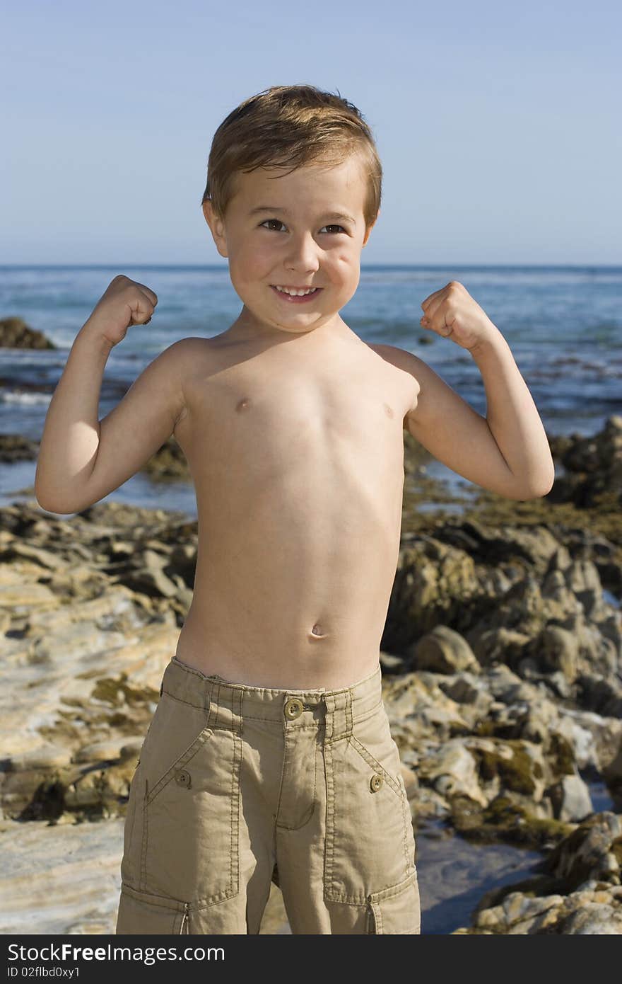 Boy is playing at the beach. Boy is playing at the beach