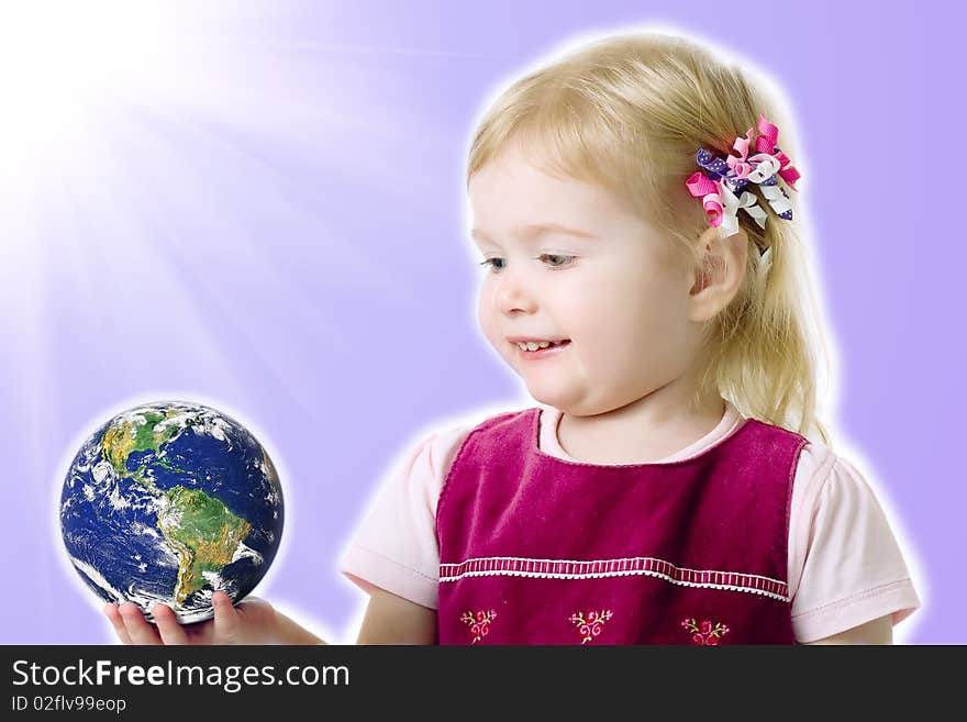 Europenian Girl 2 y.o. hold litlle globe and smiles. Europenian Girl 2 y.o. hold litlle globe and smiles