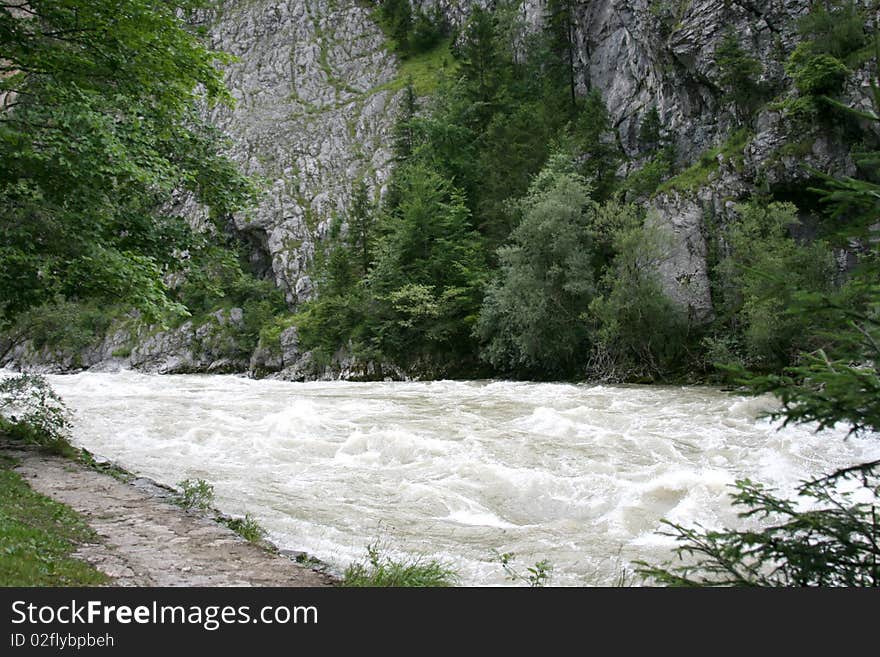 River In Mountains In Austria