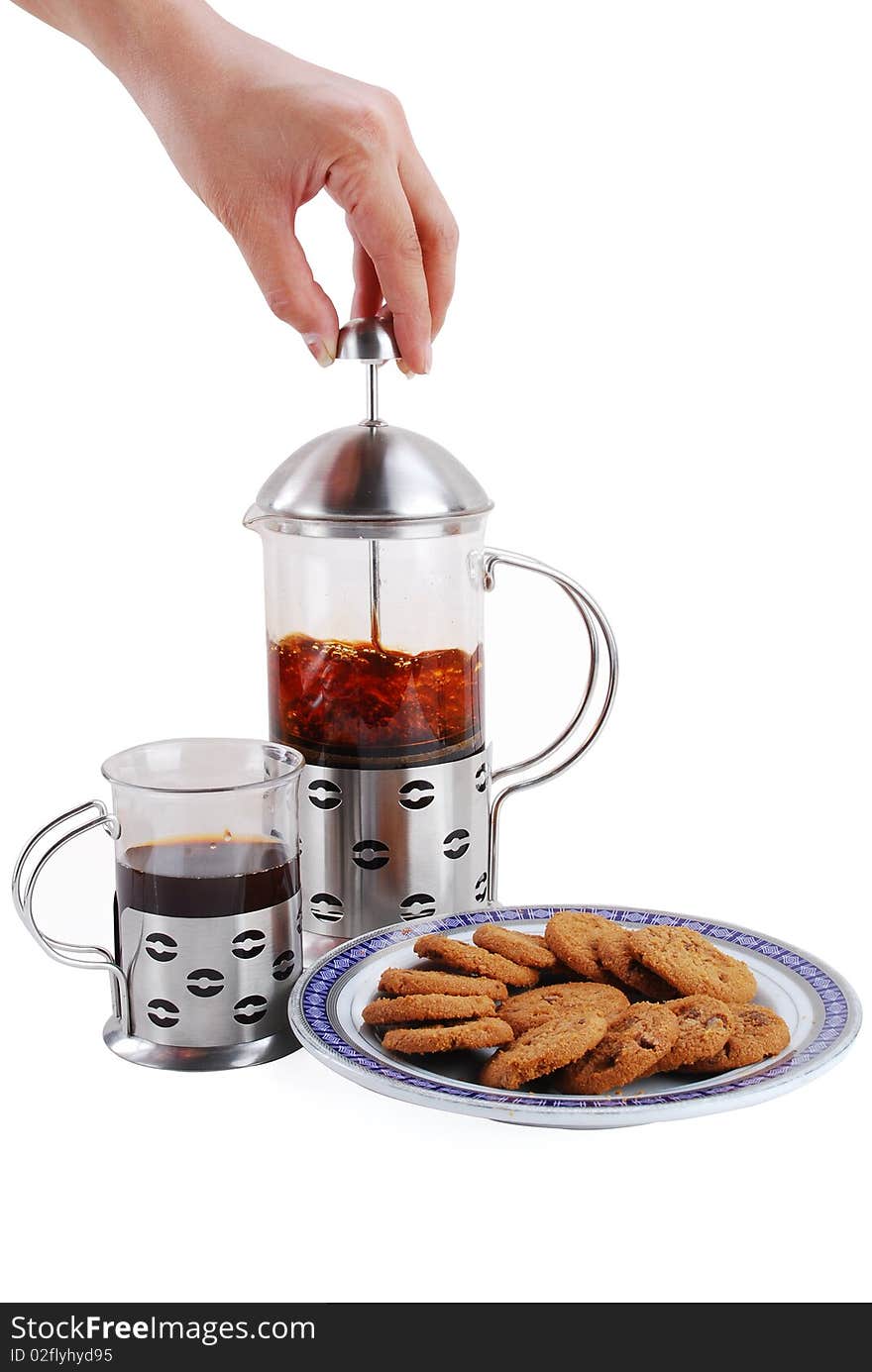 Coffee and brown cookies isolated on a white background. Coffee and brown cookies isolated on a white background.