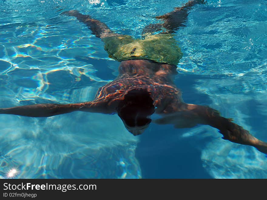 Underwater swimmer, holiday and leisure background